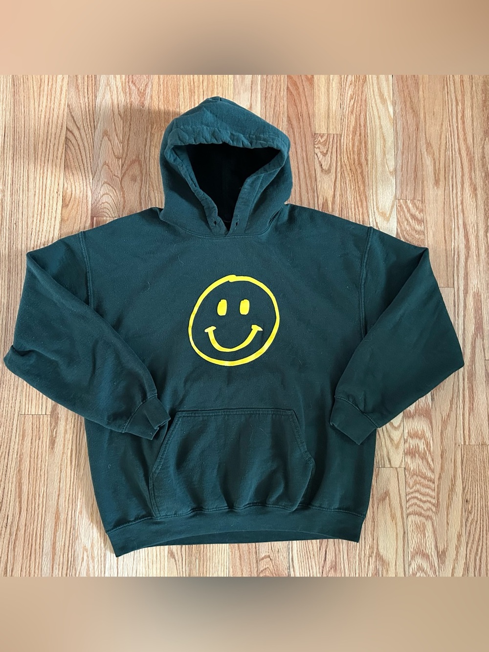 Theo Von Dark Green Hoodie with Yellow Smiley Graphic